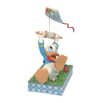 Donald Duck With Kite Figurine by Disney Traditions 6014314 A fun piece from Jim Shore as part of his Disney Traditions collection is this Donald Duck flying a kite figurine. jim shore pato donald disney