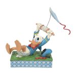 Donald Duck With Kite Figurine by Disney Traditions 6014314 A fun piece from Jim Shore as part of his Disney Traditions collection is this Donald Duck flying a kite figurine. jim shore pato donald disney