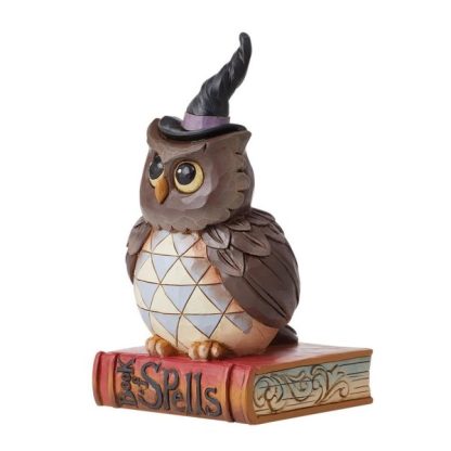 Owl Halloween Pint Figurine 6012749 "Halloween Hoot" Designed in the iconic style of Jim Shore, this Halloween owl perches on his spooky book of spells. mocho búho