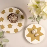 plate deco gold stars candela leonardo prato madeira