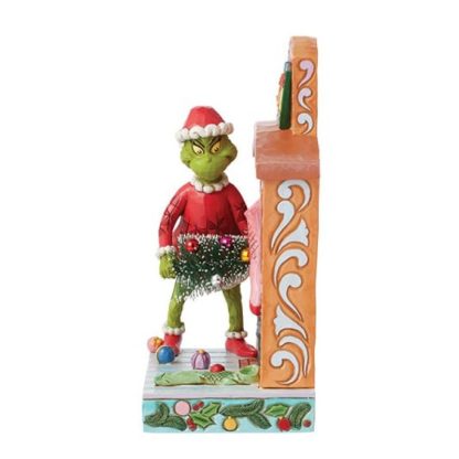 Figura Grinch na Lareira a fazer asneiras