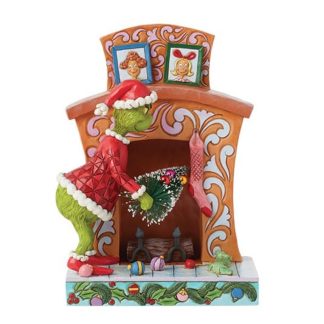 Figura Grinch na Lareira a fazer asneiras