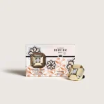 Difusor para carro metálico dourado Eternity + aroma Lady Flower (intensidade 3 de 5)